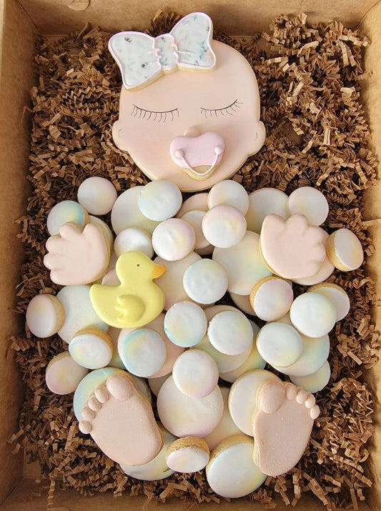Assorted custom decorated sugar cookie platters with themed royal icing designs, perfect for events, parties, and celebrations – handmade by Sugar Bites Houston.
