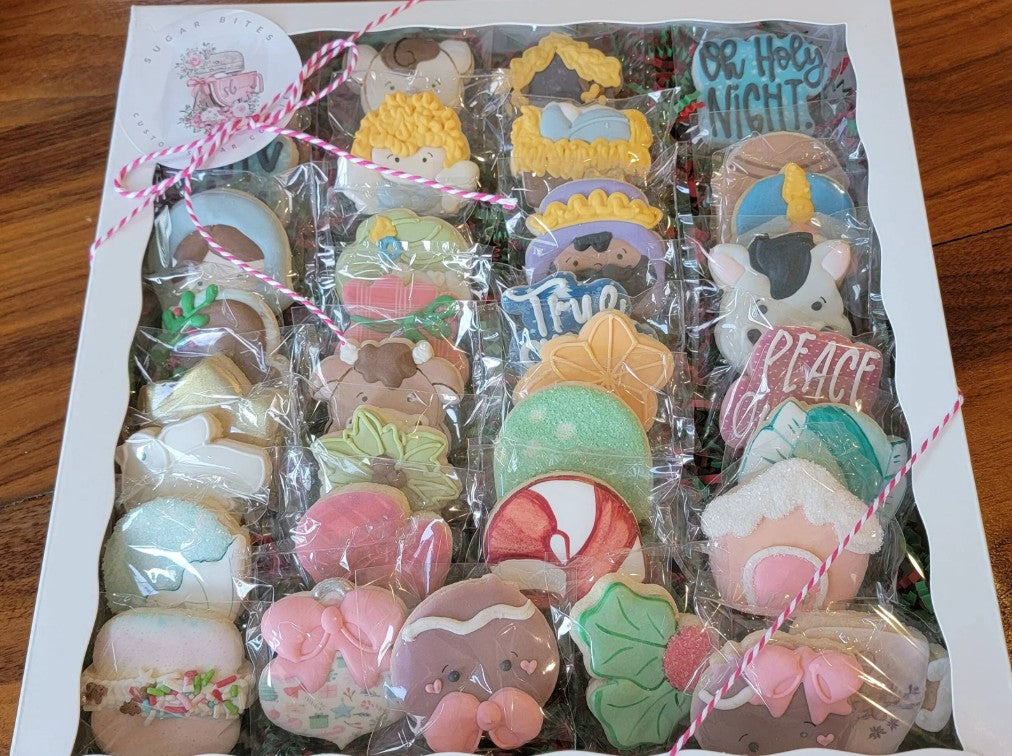 Mini custom decorated sugar cookies with detailed royal icing designs, perfect for party favors, dessert tables, and gifts – handcrafted by Sugar Bites Houston.